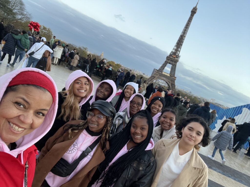 A diverse group of girls taking a group picture