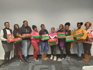 Young and adults carrying gifts