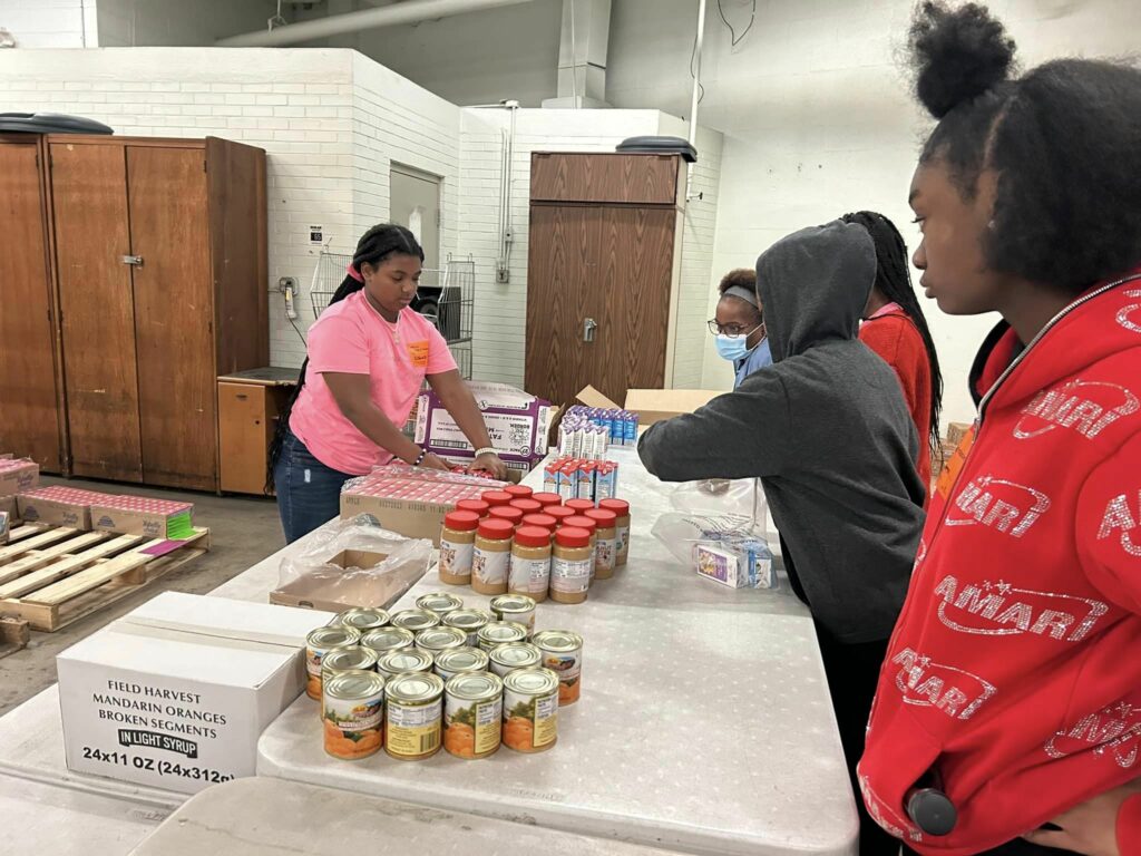Group of people packing foods